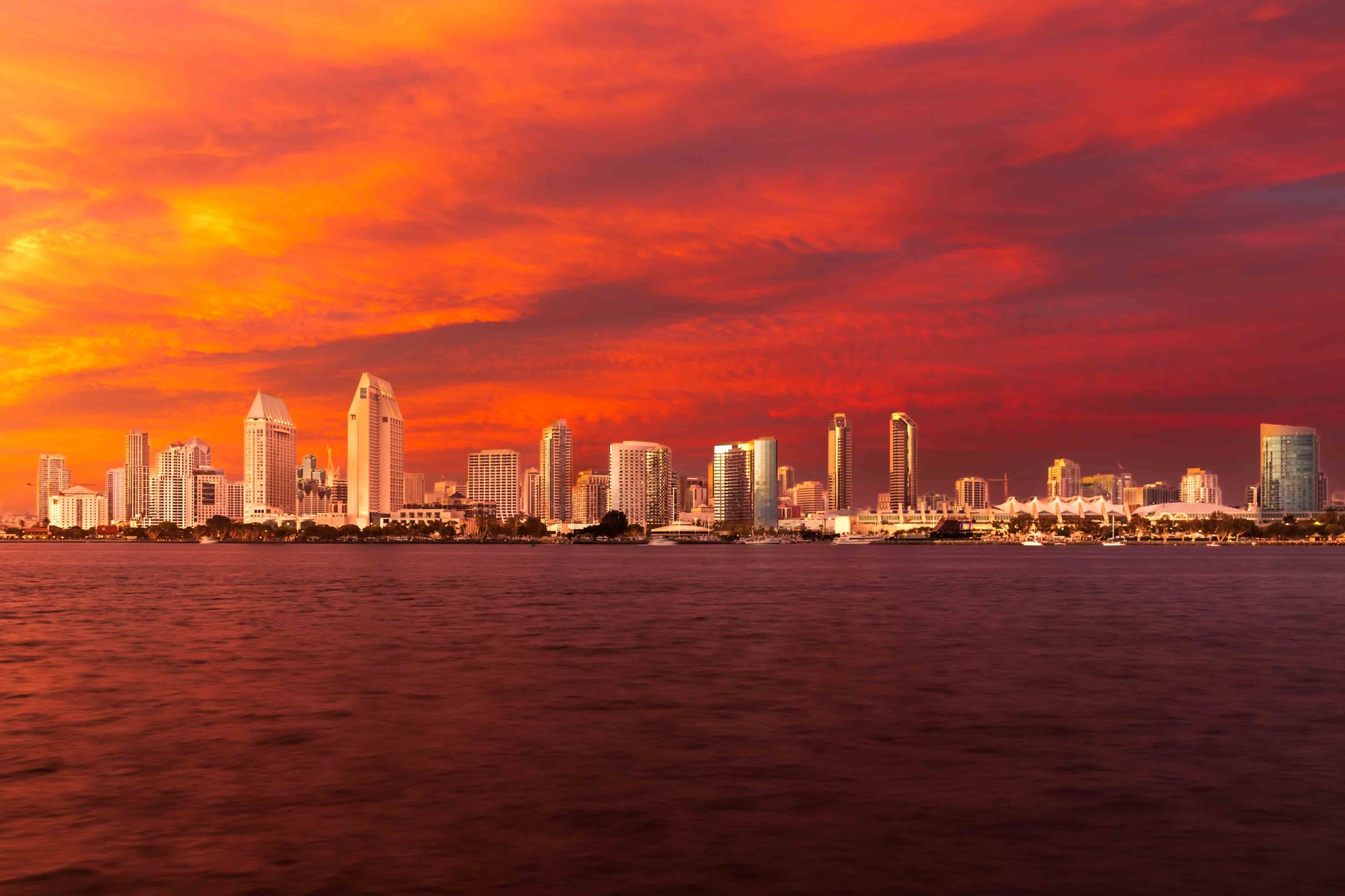 Long-exposure pier photograph at blue hour — the experience that guests consistently rate 5 stars